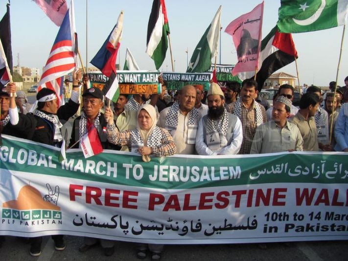 1331481717-aafia-movements-workers-participate-in-free-palestine-walk--karachi_1100762
