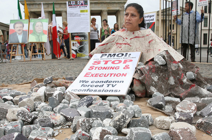 PROTESTOR BRINGING ATTENTION TO STONING