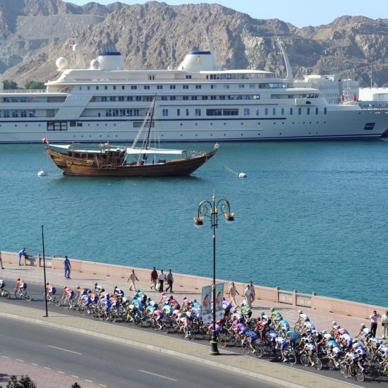 THE PELOTON IN MUSCAT ON STAGE SIX OF THE 2011 TOUR OF OMAN