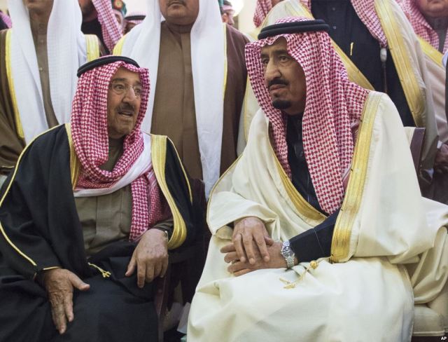 SAUDI King Salman, right, talks with Kuwait's emir, Sheikh Sabah Al-Ahmad Al-Jaber Al-Sabah,