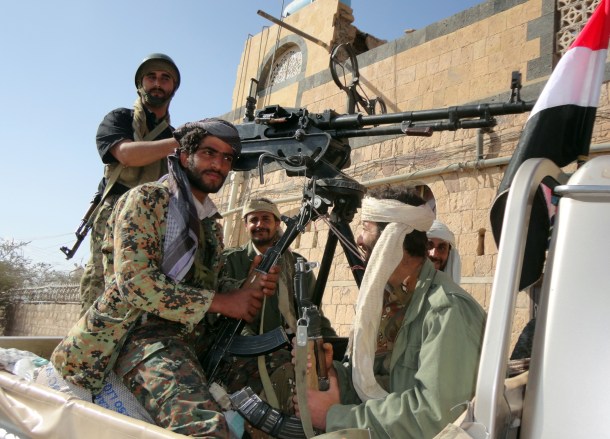 Supporters of al-Qaeda tote their rifles in the back of a pick-up truck in the town of Rada, ) southeast of the capital Sanaa, on January 23, 2012. -/AFP/Getty Images)