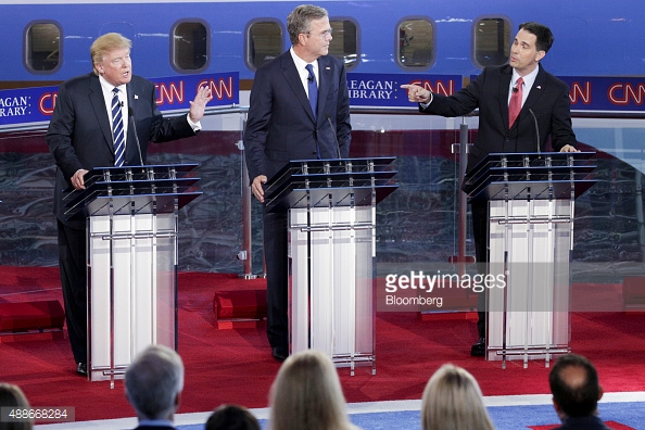 TRUMP AND OTHER CANDIDATES PODIUM 488668284