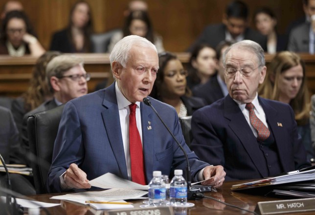 Sen. Orrin Hatch, R-Utah, left, accompanied by Senate Judiciary Committee Chairman Sen. Chuck Grassley, R-Iowa, cite-CIR-investigation (AP Photo/J. Scott Applewhite)