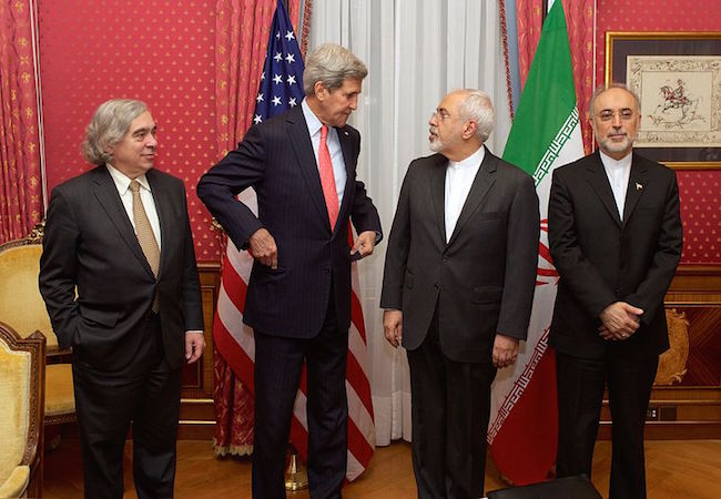 left to right: the United States Secretary of Energy Ernest Moniz, the United States Secretary of State John Kerry, the Iranian Foreign Minister Mohammad Javad Zarif and the head of the Atomic Energy Organization of Iran Ali Akbar Salehi, in the “Salon Élysée” of the Beau-Rivage Palace (Lausanne, Switzerland) (Photo: Courtesy ofWikiCommons)