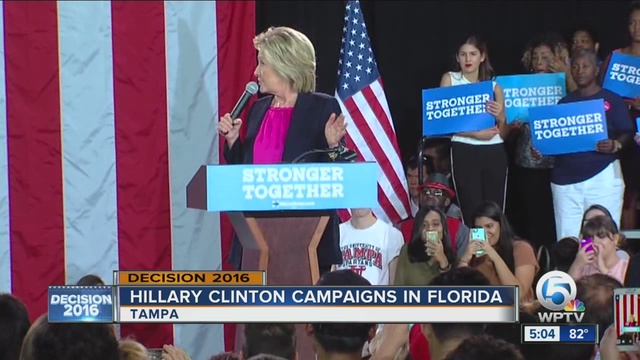 Scarlett Hynes (next to flag) President of USF democrats